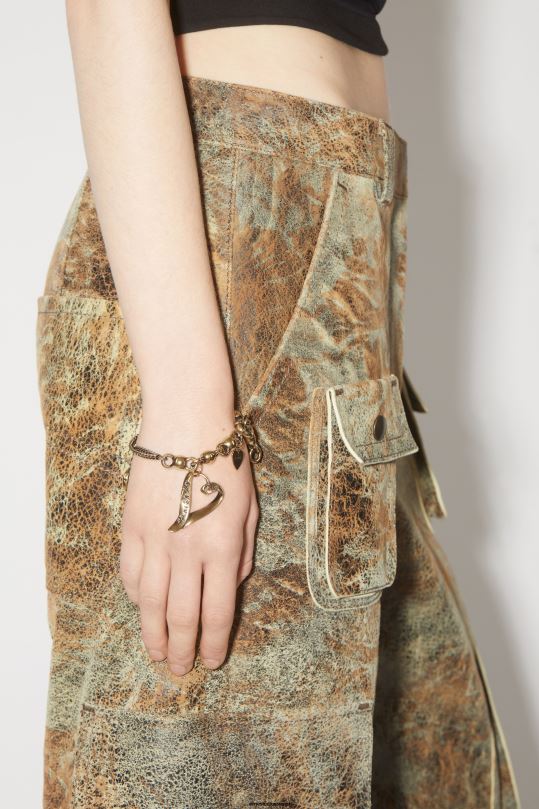 Acne Studios Lisätarvikkeet antiikki kultaa 0VF2B703 onnenamuletti