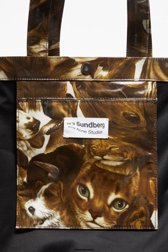 Acne Studios Lisätarvikkeet konjakinruskea multi 0VF2B622 logolla varustettu olkalaukku