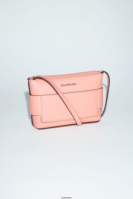 Acne Studios Lisätarvikkeet lohen pinkki 0VF2B865 musubi mini crossbody laukku