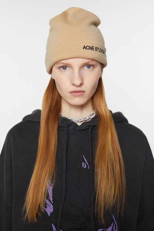 Acne Studios Lisätarvikkeet kuori beige 0VF2B814 logopipo